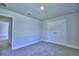 Bedroom with plush carpeting and a spacious closet at 4019 Tullamore Ln, Auburndale, FL 33823