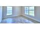 Bedroom featuring tile floors, neutral paint, and windows offering great natural light and views at 4019 Tullamore Ln, Auburndale, FL 33823