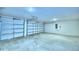 Spacious three car garage with ample room for vehicles and storage at 4019 Tullamore Ln, Auburndale, FL 33823