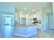 Open kitchen with granite countertops and an island sink perfect for entertaining at 4019 Tullamore Ln, Auburndale, FL 33823
