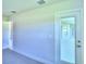 Room with plush carpeting and access to the outdoors at 4019 Tullamore Ln, Auburndale, FL 33823