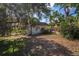 Backyard includes a shed and an alley way behind the property at 402 W Patterson St, Lakeland, FL 33803