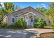 Charming home with a well-maintained front yard and a welcoming entrance, perfect for a cozy and inviting curb appeal at 402 W Patterson St, Lakeland, FL 33803