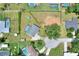 An aerial view shows the full property with a marked boundary line at 404 Willow Run, Lakeland, FL 33813