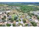 Aerial view of property with arrow, showing the house location in a quiet neighborhood with easy access to lakes at 404 Willow Run, Lakeland, FL 33813