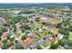Aerial view of the property with an arrow showing the location of the house in the neighborhood at 404 Willow Run, Lakeland, FL 33813