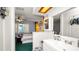 Open bathroom layout leading to a bedroom with natural light at 417 Yolonda Ct, Lakeland, FL 33809