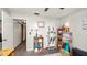 Bedroom with hardwood floors, natural lighting, and exercise equipment at 417 Yolonda Ct, Lakeland, FL 33809