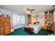 This bedroom has natural lighting and carpeted floors at 417 Yolonda Ct, Lakeland, FL 33809