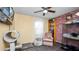 Bedroom with natural light, hardwood floors, and a bookshelf at 417 Yolonda Ct, Lakeland, FL 33809