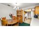 The dining room area boasts wooden features and flows into the kitchen at 417 Yolonda Ct, Lakeland, FL 33809