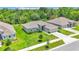 Well-kept single-Gathering home with green lawn and mature trees in a Gathering-friendly neighborhood at 4582 Penkert Pl, Lakeland, FL 33811