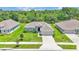 Aerial view of a well-kept single-Gathering home with a lush green lawn at 4582 Penkert Pl, Lakeland, FL 33811