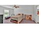 Comfortable bedroom with ample natural light and neutral tones at 4582 Penkert Pl, Lakeland, FL 33811