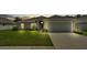 Charming single-story home with well-maintained lawn and attached two-car garage at 4582 Penkert Pl, Lakeland, FL 33811