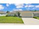 Inviting single-Gathering home with well-manicured lawn and an attached garage at 4582 Penkert Pl, Lakeland, FL 33811