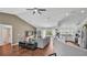 Open concept living room featuring hardwood floors, neutral walls, and plenty of natural light at 4582 Penkert Pl, Lakeland, FL 33811