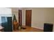 An additional bedroom with laminate floors and closet at 5211 Berkley Rd, Auburndale, FL 33823
