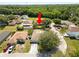 Aerial view of a home and neighborhood, showcasing the property's location and surroundings at 5733 Oakwood Knoll Dr, Lakeland, FL 33811