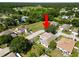 An aerial view of the neighborhood, showing the home's location and surrounding greenery at 5733 Oakwood Knoll Dr, Lakeland, FL 33811