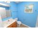 Colorful bathroom with vanity and shower at 5733 Oakwood Knoll Dr, Lakeland, FL 33811