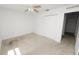 Neutral bedroom with standard closet and ceiling fan at 5733 Oakwood Knoll Dr, Lakeland, FL 33811
