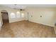 Bright, open living room featuring tile floors, three arched niches, and neutral paint at 5733 Oakwood Knoll Dr, Lakeland, FL 33811
