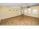 Open living room with tile flooring, recessed niches, and neutral paint at 5733 Oakwood Knoll Dr, Lakeland, FL 33811