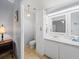 Ensuite bathroom with recessed lighting, storage, and a vanity sink at 6087 Southern Oaks Se Dr, Winter Haven, FL 33884