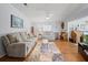 Spacious living room featuring hardwood floors and neutral paint at 6087 Southern Oaks Se Dr, Winter Haven, FL 33884