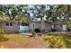Backyard patio with lounge furniture, perfect for outdoor living at 618 W Oak Dr, Lakeland, FL 33803