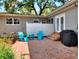 Backyard brick patio with outdoor furniture at 618 W Oak Dr, Lakeland, FL 33803