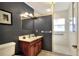 Bathroom features vanity, mirror and shower at 618 W Oak Dr, Lakeland, FL 33803