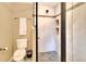 Nicely tiled shower with built-in shelving in updated bathroom at 618 W Oak Dr, Lakeland, FL 33803