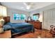 Bedroom with hardwood floors, traditional furniture and natural light at 618 W Oak Dr, Lakeland, FL 33803