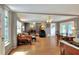 Open floor plan featuring multiple living spaces with hardwood floors and neutral paint at 618 W Oak Dr, Lakeland, FL 33803