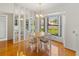 Bright dining room with wood floors and natural lighting at 6194 Sanderling Dr, Lakeland, FL 33809
