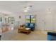 Inviting living room featuring a cozy seating area and bright natural light at 6194 Sanderling Dr, Lakeland, FL 33809