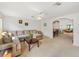 Open-concept living area with comfortable sectional and dining area at 6194 Sanderling Dr, Lakeland, FL 33809