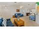 Bright living room featuring vaulted ceilings and comfortable seating at 6194 Sanderling Dr, Lakeland, FL 33809