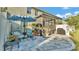Spacious backyard with a patio, comfortable seating, and a serene view of the surroundings at 6435 Sedgeford Dr, Lakeland, FL 33811
