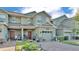 Charming two-story townhome features a one car garage and inviting front yard at 6435 Sedgeford Dr, Lakeland, FL 33811