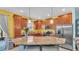 Spacious kitchen featuring a large center island with granite countertops at 6435 Sedgeford Dr, Lakeland, FL 33811
