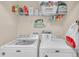Functional laundry room with updated appliances and storage at 6435 Sedgeford Dr, Lakeland, FL 33811