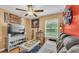 Inviting living room with movie decor, ceiling fan, a TV, and a comfortable sofa at 6435 Sedgeford Dr, Lakeland, FL 33811