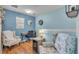Office space with a desk, chair, and decorative armchairs at 6435 Sedgeford Dr, Lakeland, FL 33811
