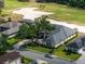 Home overlooking a golf course, showcasing stunning views and serene living, complete with lush greenery and mature trees at 645 Whisper Woods Dr, Lakeland, FL 33813