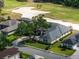 Home with a view of a golf course, surrounded by verdant trees, providing a serene and picturesque backdrop at 645 Whisper Woods Dr, Lakeland, FL 33813
