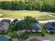 Beautiful home, backing onto a lush golf course with mature trees, providing stunning views and serene living at 645 Whisper Woods Dr, Lakeland, FL 33813