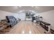 Finished bonus room featuring workout equipment, ample storage, and neutral walls at 645 Whisper Woods Dr, Lakeland, FL 33813